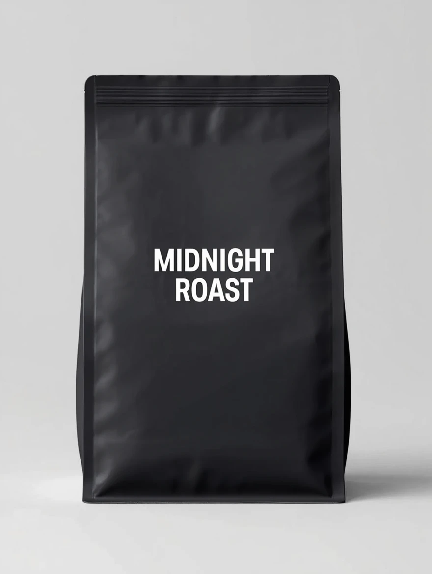 The same coffee bag edited to a charcoal bag reading "MIDNIGHT ROAST"